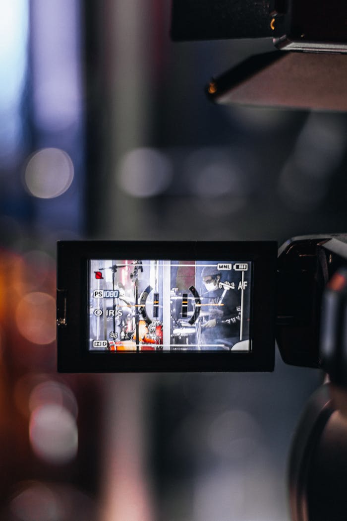Close-up view of a camera screen filming a studio setup in Curitiba, Brazil.